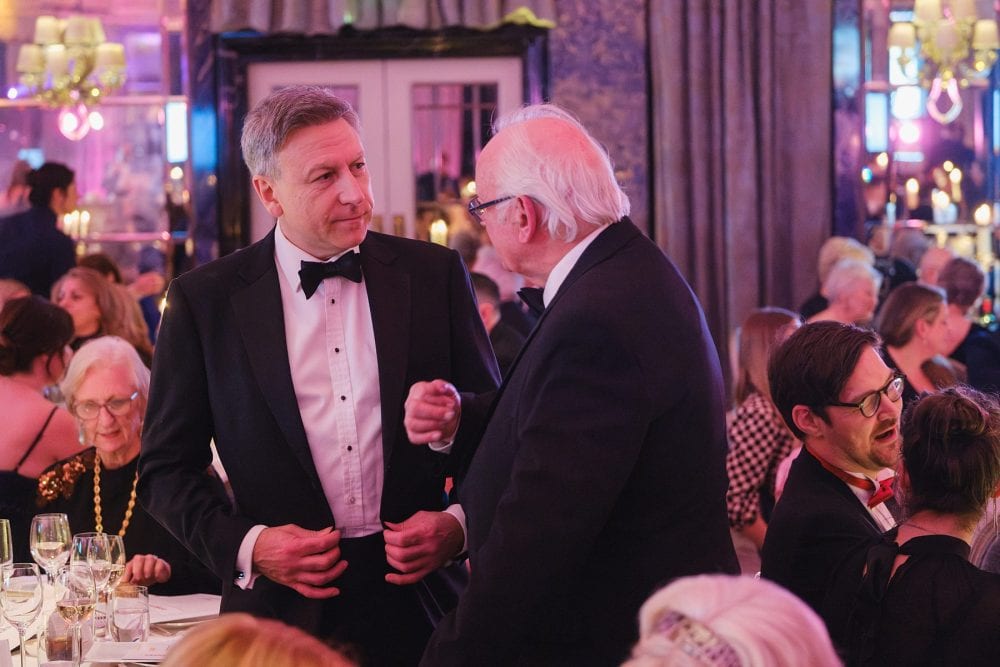 Pete Waterman meeting Davina McCall's surgeon at the Alfie Boe performing at the Brain Tumour Research gala in the ballroom at The Dorchester, London