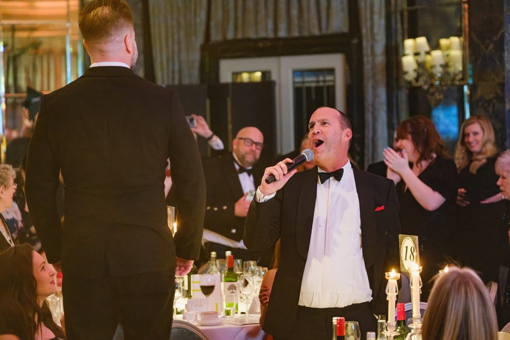 Johnny Vaughan and Alfie Boe performing at the Brain Tumour Research gala in the ballroom at The Dorchester, London