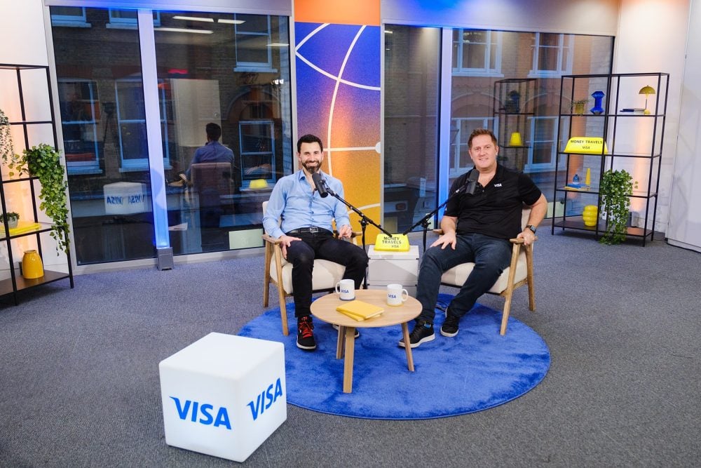 a wide shot of Maxime Guirauton and Richard Arundel on the set of their podcast Money Travels for VISA Direct