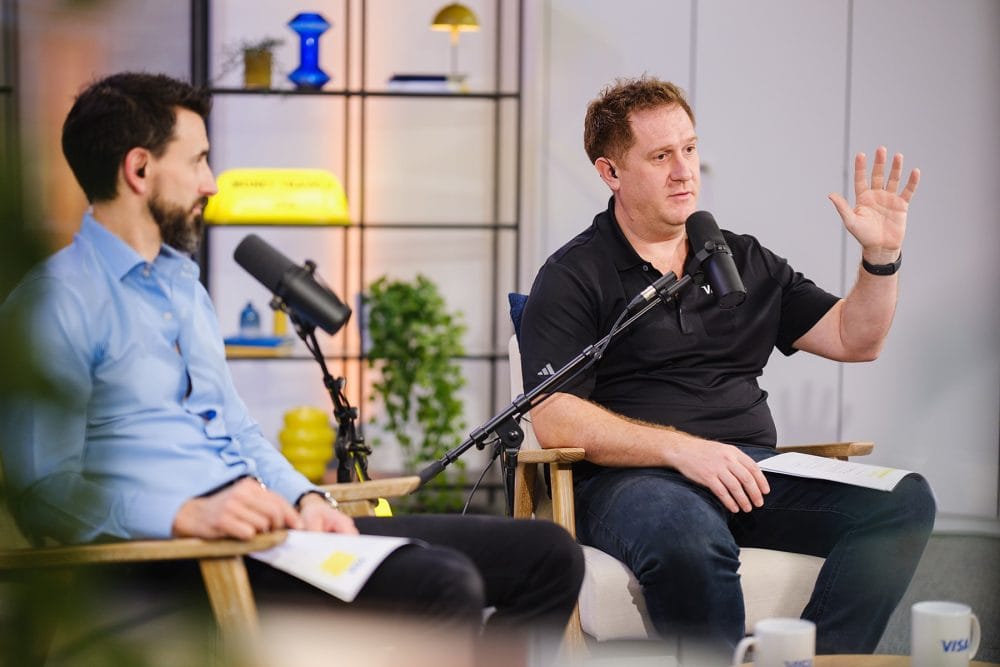 podcast PR photo showing Maxime Guirauton and Richard Arundel recording an episode of money travels podcast for VISA direct