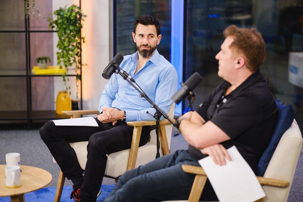 podcast PR photo showing Maxime Guirauton and Richard Arundel recording an episode of money travels podcast for VISA direct