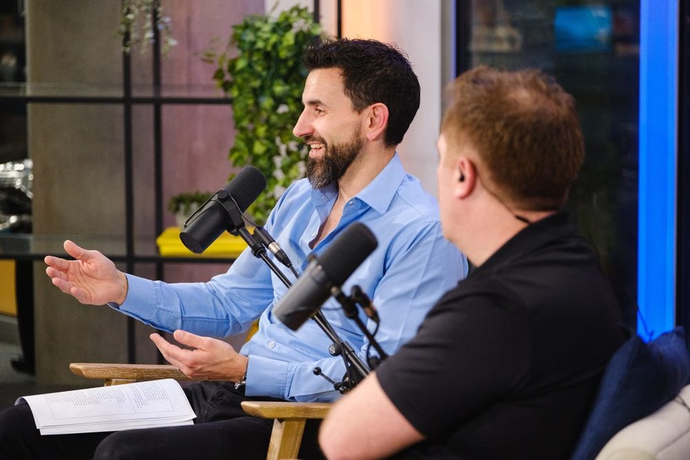 podcast PR photo showing Maxime Guirauton and Richard Arundel recording an episode of money travels podcast for VISA direct