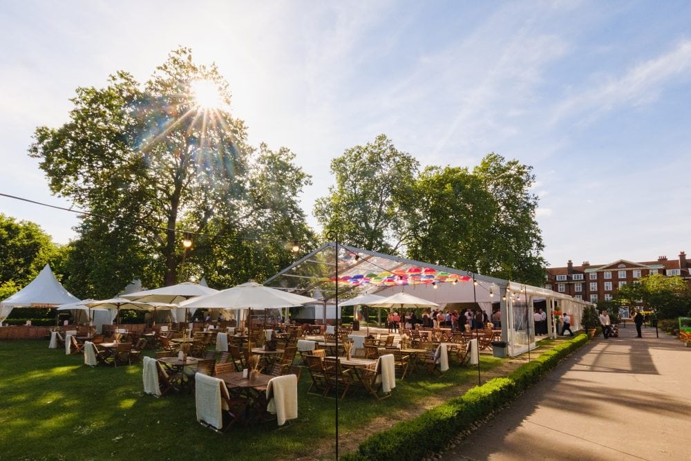 Wide shot of York Lawns with marquee at summer party