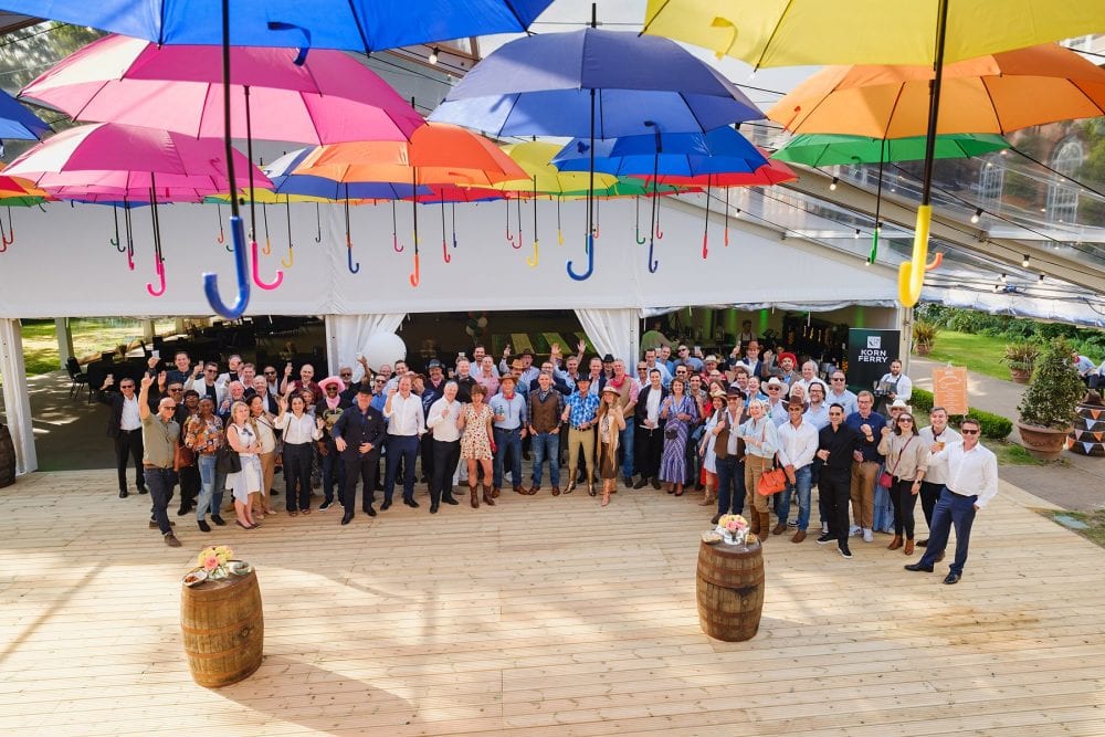Wide group shot of guests at Regent’s University summer party