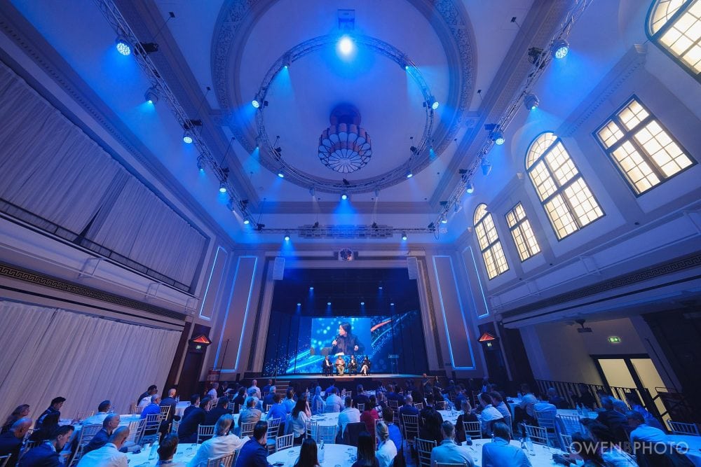Wide-angle view of the main hall during a Vision Hall conference