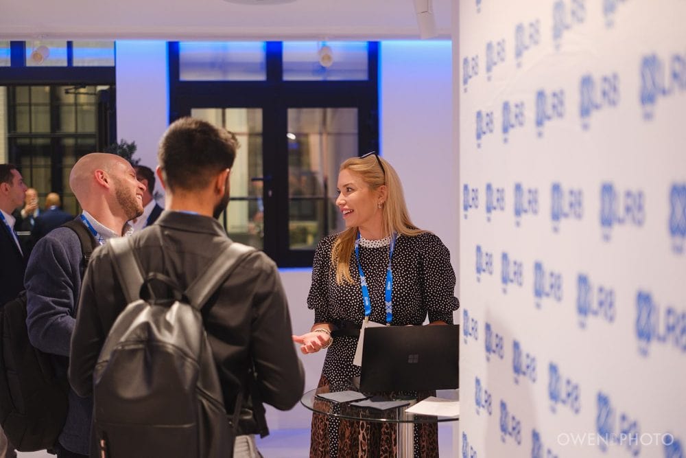 Reception networking captured during a Vision Hall corporate event