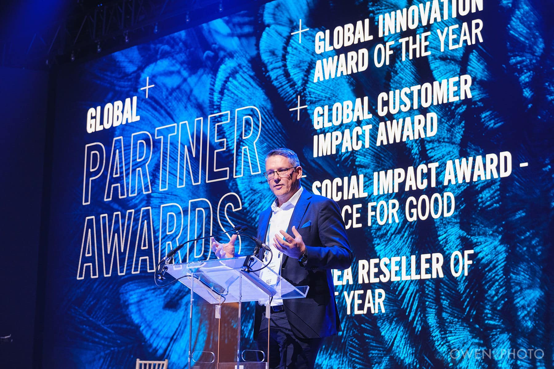 Awards presentation on stage during a Vision Hall corporate event