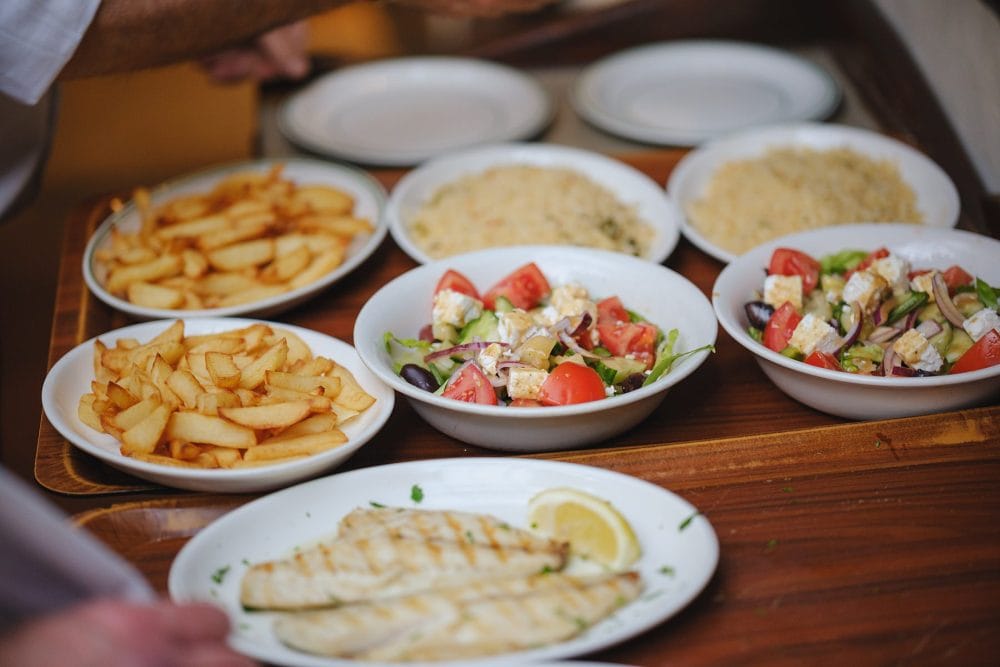 Plates of Greek dishes served at Lemonia for celebration